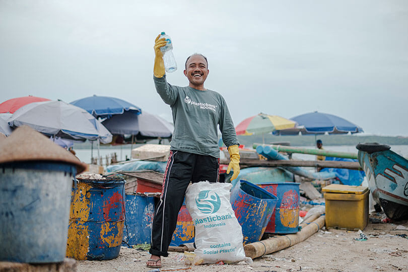 Plastic Bank collection member in Bali collecting plastic waste