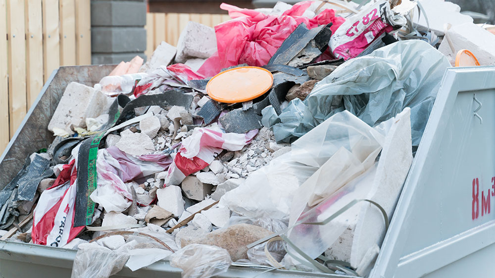 Container with building waste close up