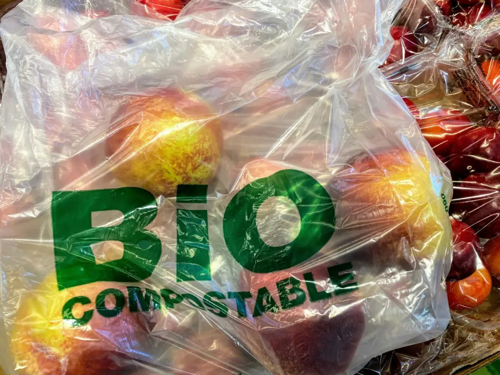 A bioplastic bag carrying apples