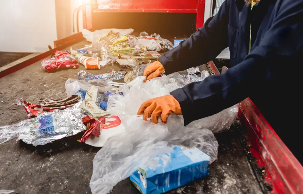 sorting flexible plastic from other types of plastic at a recycling plant